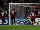 Milan's Mario Balotelli scores the equaliser from the penalty spot against Ajax during their Champions League group match on October 1, 2013