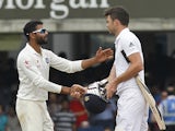 Indias Ravindra Jadeja shakes hands with Englands James Anderson after India win the match by 95 runs on the fifth day of the second cricket Test match between England and India at Lord's cricket ground in London on July 21, 2014