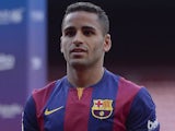 New signing Douglas is unveiled at Barcelona on August 29, 2014