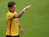 Watford defender Daryl Janmaat gestures during the Premier League match between Watford and Arsenal on August 27, 2016