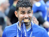 Diego Costa eats his medal during the Premier League game between Chelsea and Sunderland on May 21, 2017
