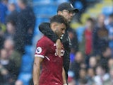Jurgen Klopp consoles the cursed Alex Oxlade-Chamberlain after the Premier League game between Manchester City and Liverpool on September 9, 2017