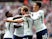 Harry Kane celebrates scoring the second with teammates during the Premier League game between West Ham United and Tottenham Hotspur on September 23, 2017