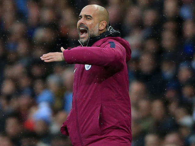 Pep Guardiola gesticulates during the Premier League game between Manchester City and Burnley on October 21, 2017