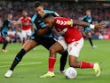 Middlesbrough's Britt Assombalonga in action with West Bromwich Albion's Jake Livermore on August 24, 2018