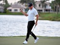 Keith Mitchell reacts after making a birdie putt on the 18th green during the final round of The Honda Classic golf tournament at PGA National on March 4, 2019