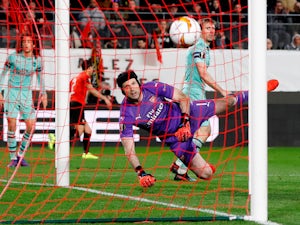 Nacho Monreal scores past Petr Cech during the Europa League game between Rennes and Arsenal on March 7, 2019