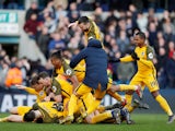 Brighton & Hove Albion players celebrate their penalty shootout victory over Millwall in the FA Cup quarter-finals on March 17, 2019