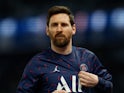 Lionel Messi warms up for Paris Saint-Germain in February 2022