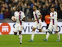 Lyon's Tanguy Ndombele celebrates scoring their first goal on April 7, 2022