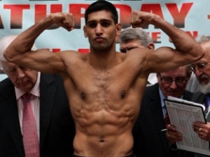 Khan questions Mayweather challenge