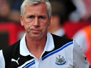 Pardew wary of Anfield atmosphere