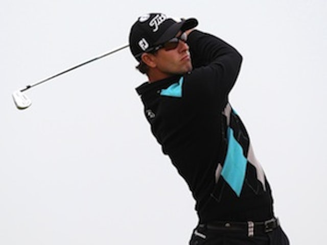 Scott takes lead at Open Championship