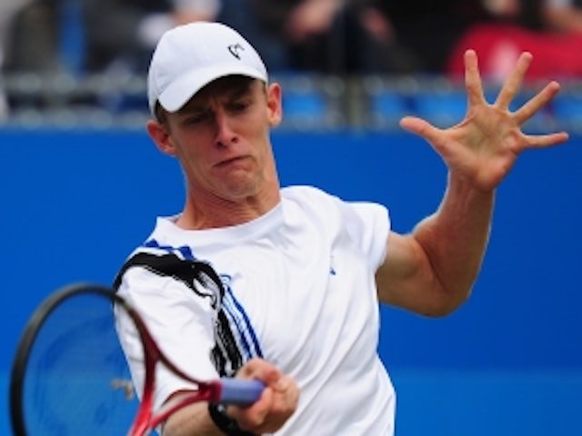 Anderson battles back to oust Ebden