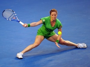 Clijsters storms into third round