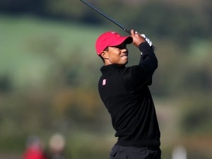Tiger Woods leads in Australia