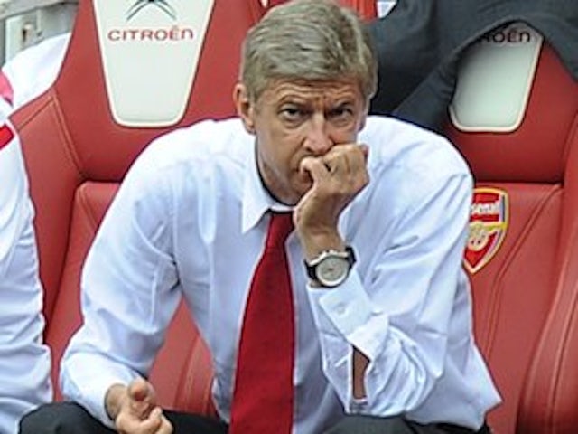 Wenger hits out at players' wages