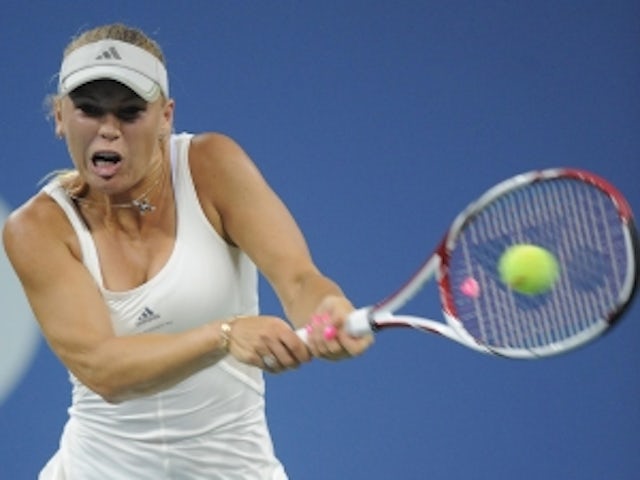 Wozniacki claims straight-sets win
