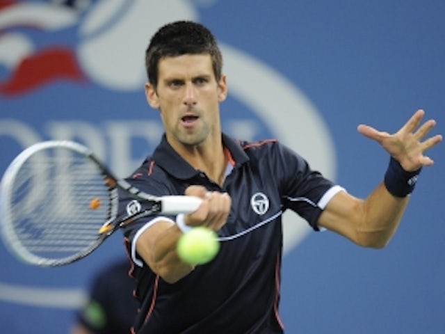 Djokovic edges past Berdych in ATP finals