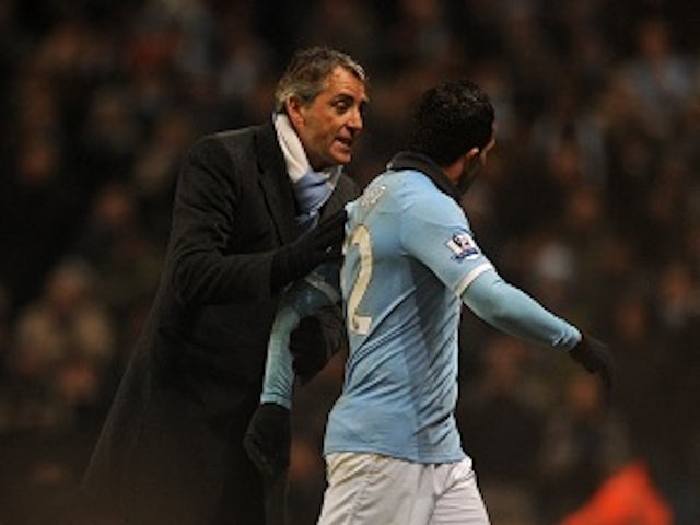 Mancini offers Tevez Man City hope