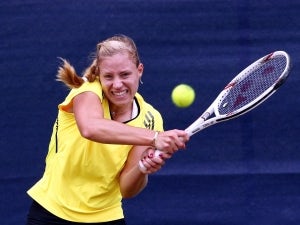 Kerber eases into round three