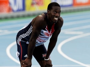 Christian Malcolm out of 200m