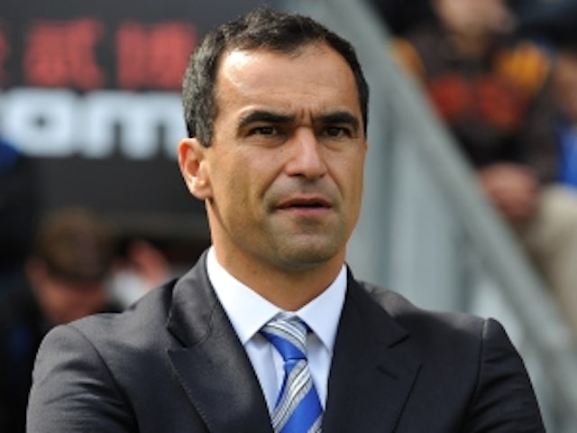 Martinez delighted with 