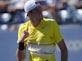 Isner eases into second round