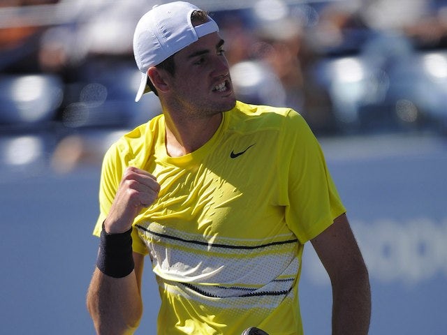 Isner eases into quarter-final over Raonic