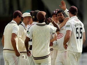 Surrey promoted to Division One