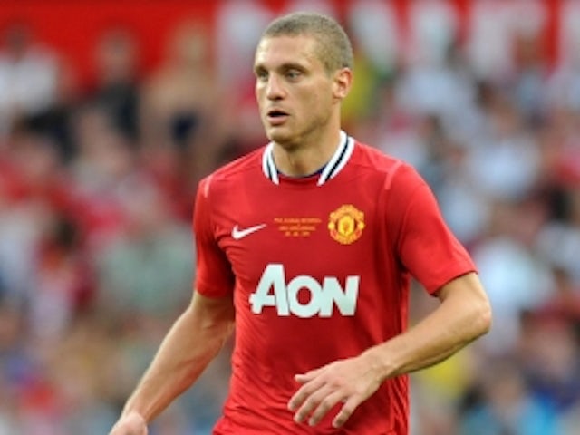 Vidic out 