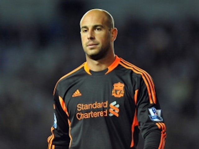 Rodgers leaps to Reina's defence