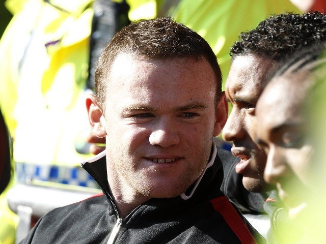 Rooney criticises 12pm start