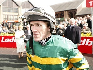 McCoy wins Aintree opener on day two