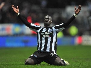 Cheick Tiote stretchered off