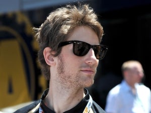 Grosjean fastest in wet final practice