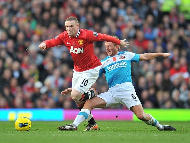 Rooney backs Villas-Boas