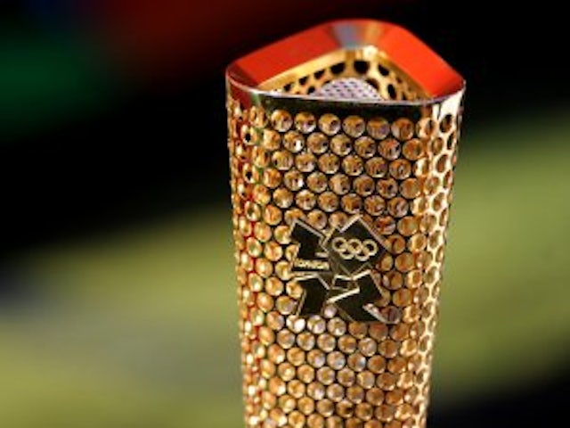 Who will light the Olympic flame?
