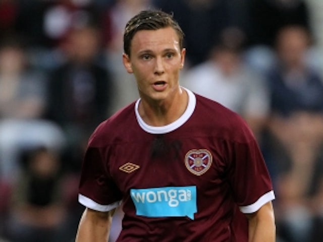 Wolves sign Hearts midfielder