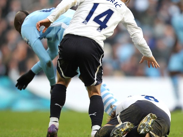 Neville warns players against 'Balotelli games'