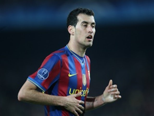 Busquets signs new Barcelona deal