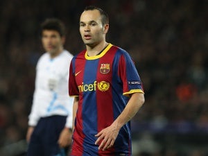 Iniesta expects stern test