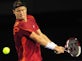 Hewitt causes Cilic upset