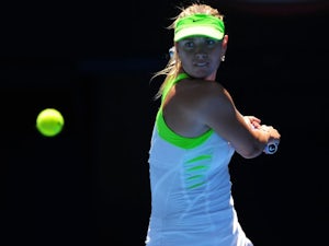 Sharapova eases to second round