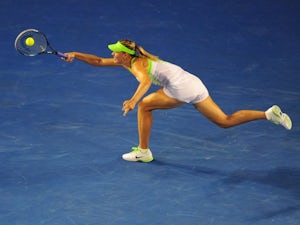 Sharapova edges Petrova in New York