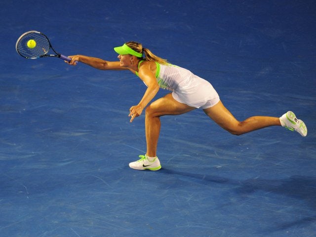 Sharapova advances to round four