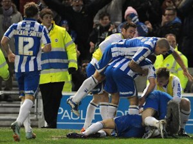 Buckley brace sinks Huddersfield