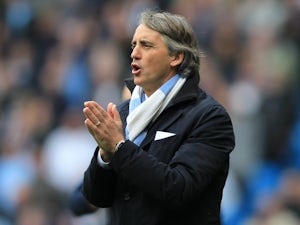 Mancini pleased with Man City patience