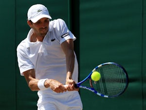 Benneteau defeats Muller at Wimbledon