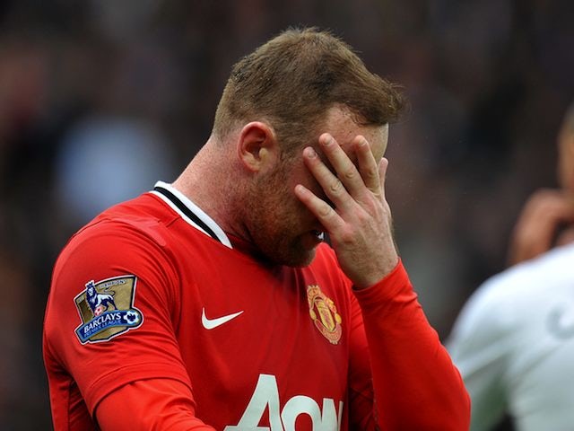 Rooney 'heartbroken' by title loss